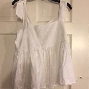 cute white flowy tank perfect for hot summer days